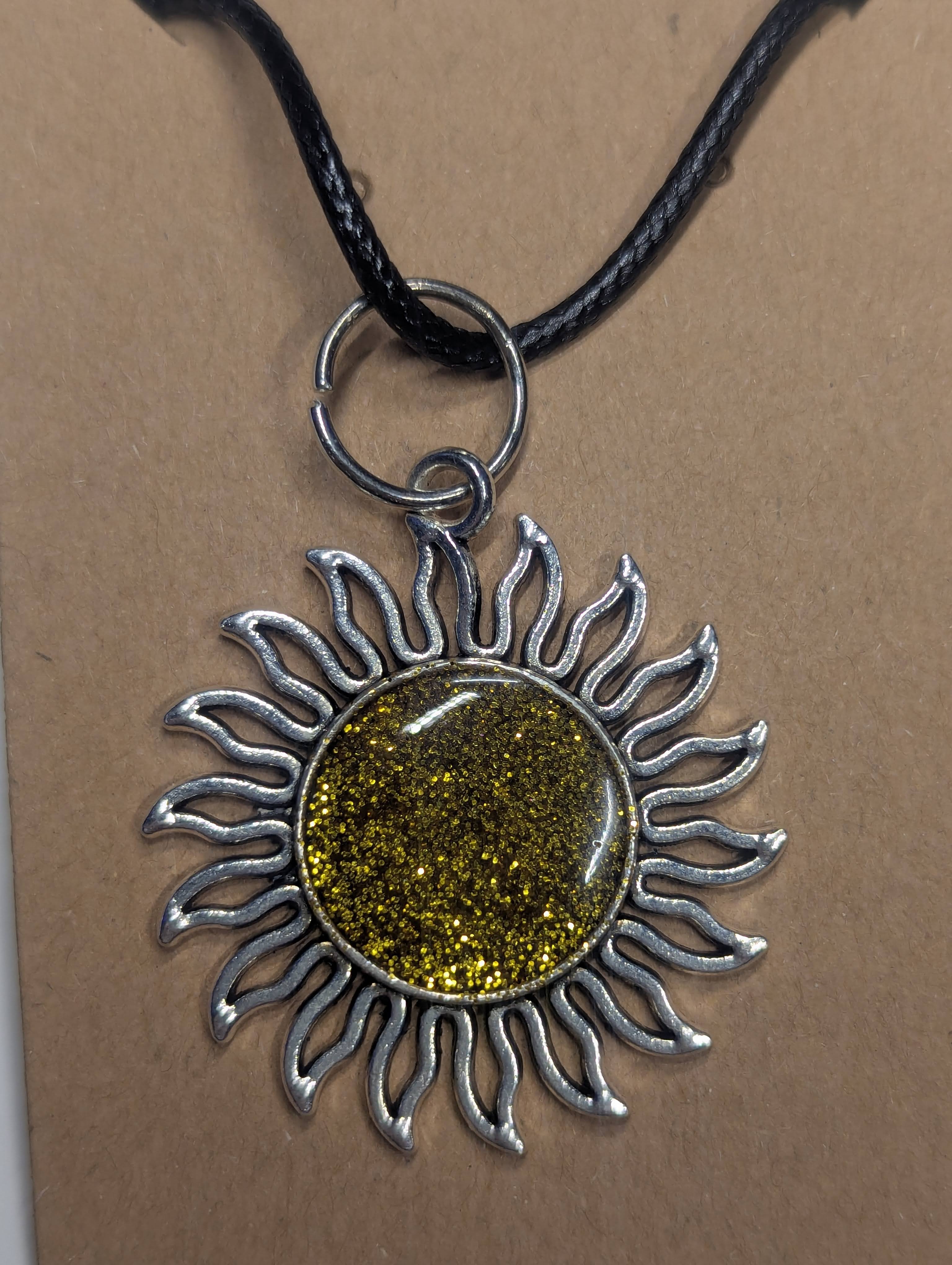 Golden Sunburst Resin Pendant on Leather Cord