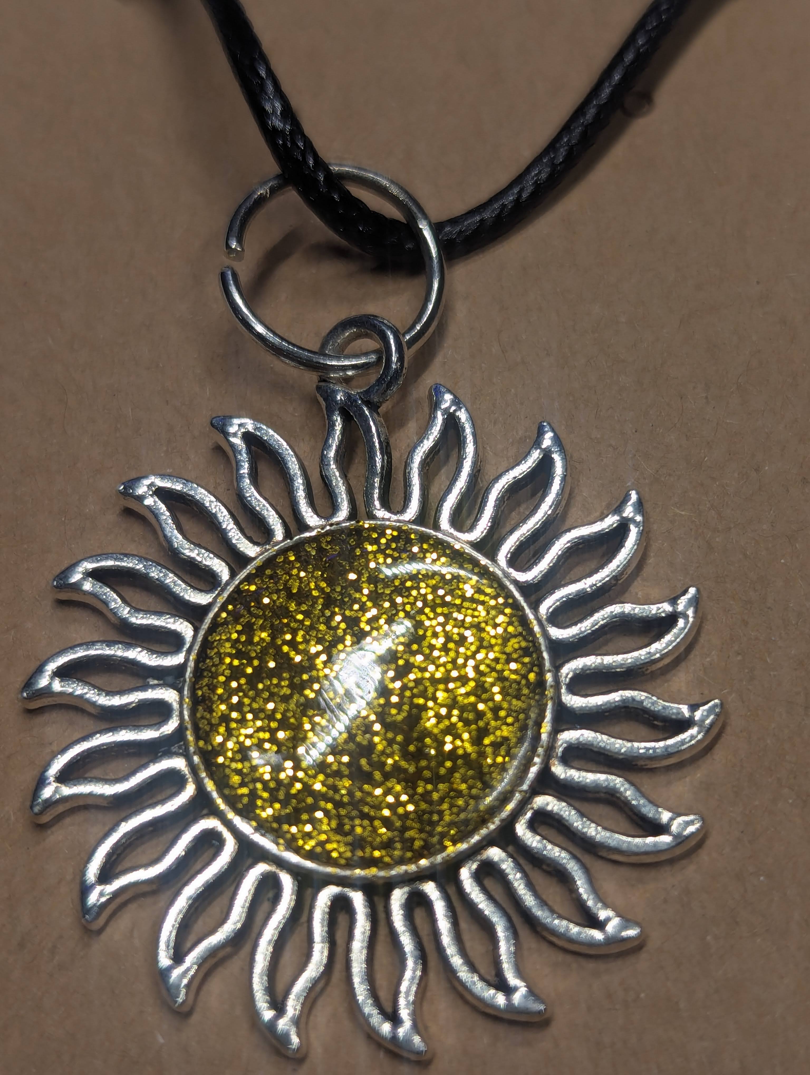 Golden Sunburst Resin Pendant on Leather Cord