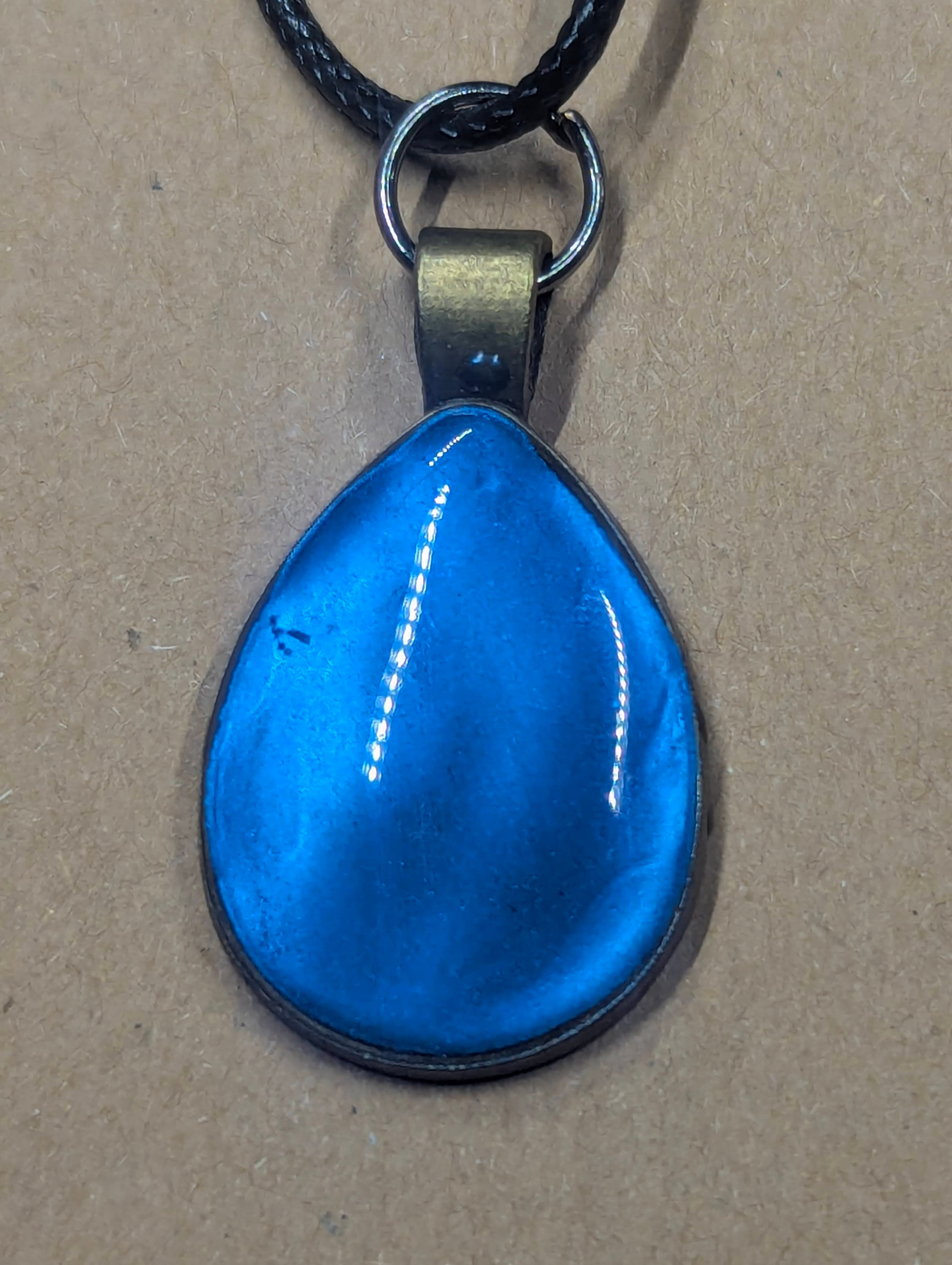 Tidal Shift Blue Color‑Change Pendant on Leather Cord