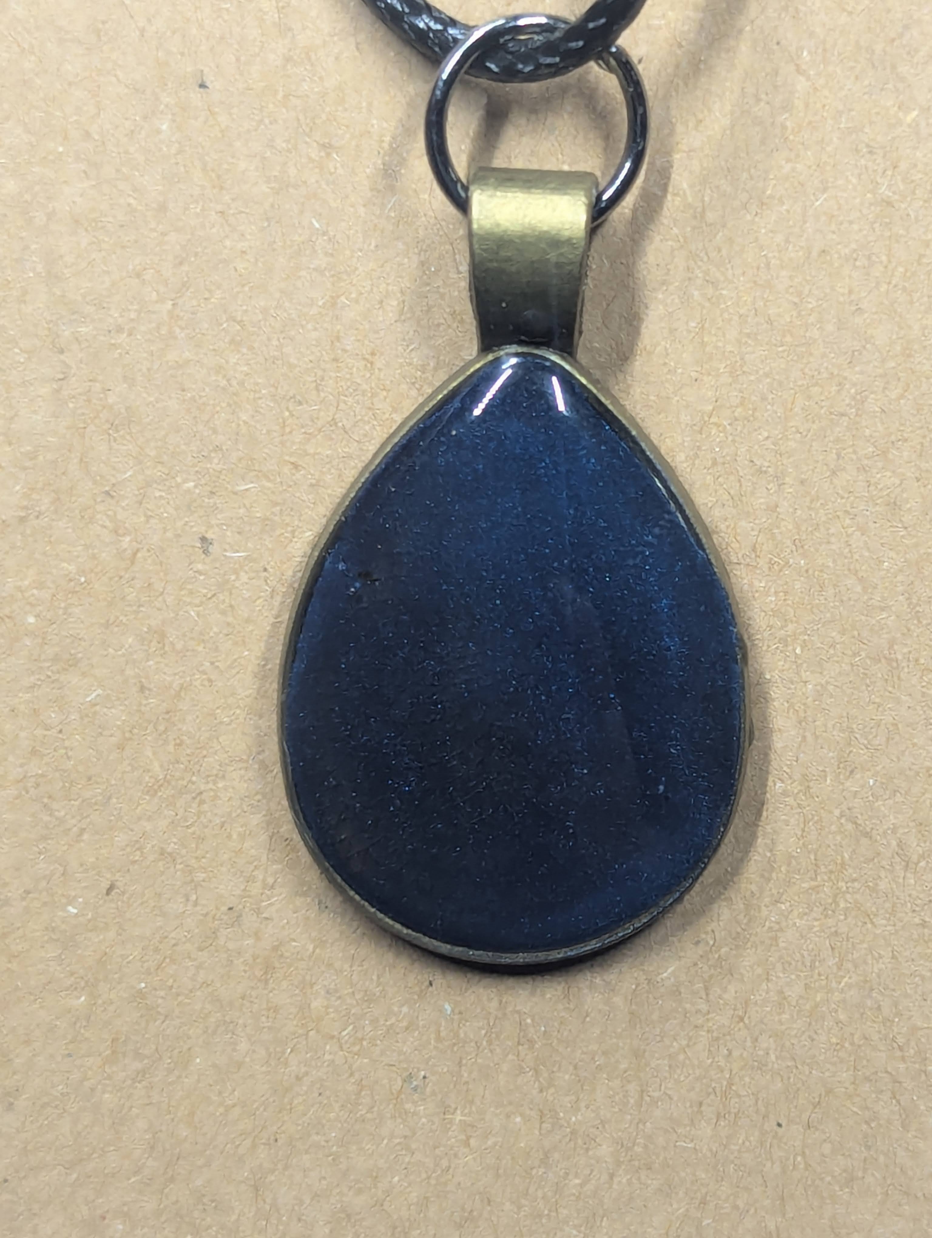 Tidal Shift Blue Color‑Change Pendant on Leather Cord