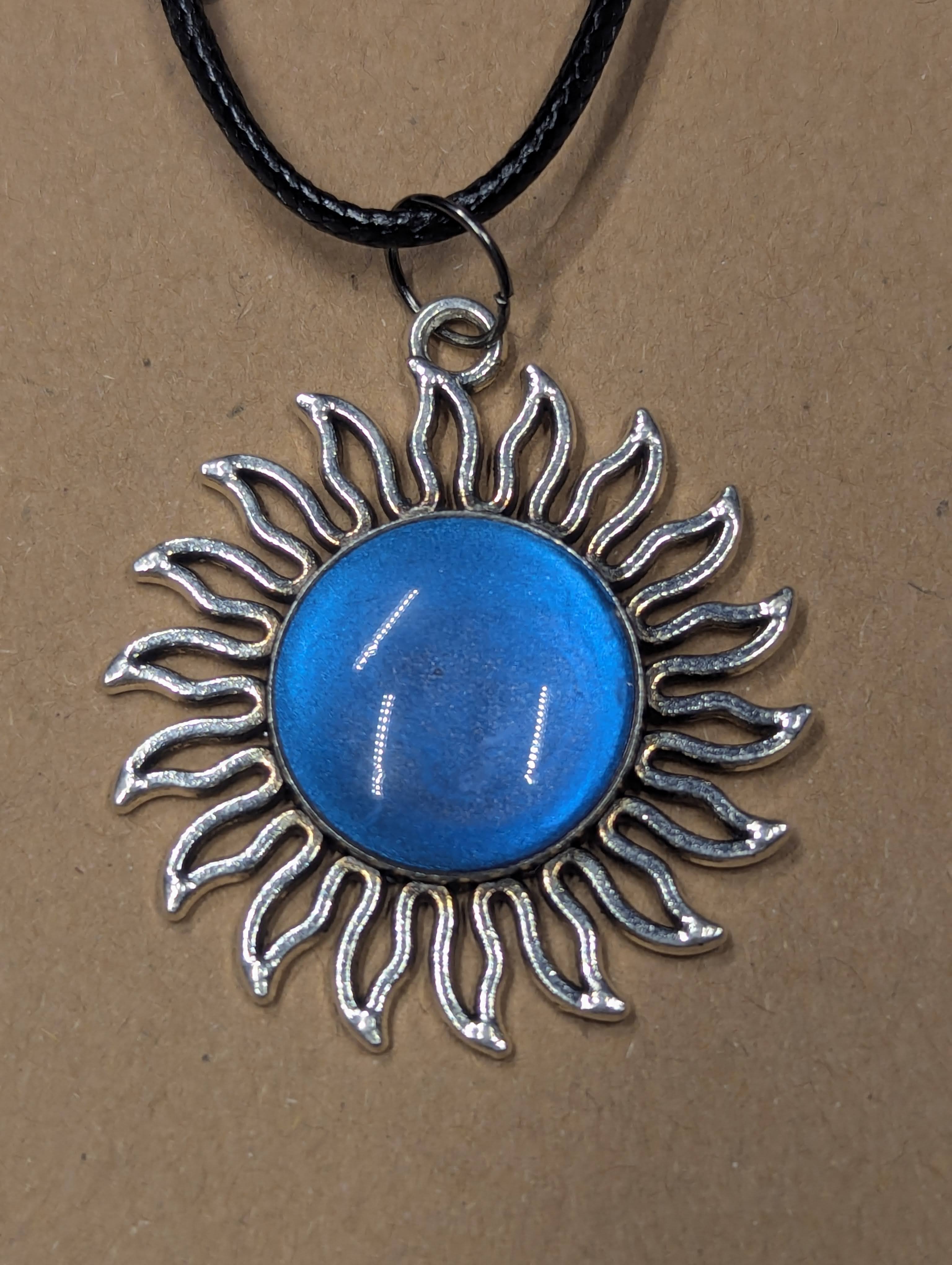 Tidal Blue Color‑Shift Sun Pendant on Leather Cord